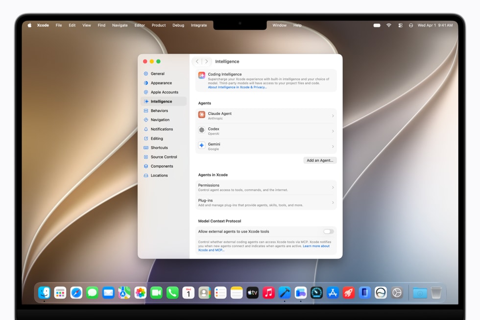 MacBook ProでXcode 27の設定ページが表示され、コーディングエージェントの選択画面が映っている様子