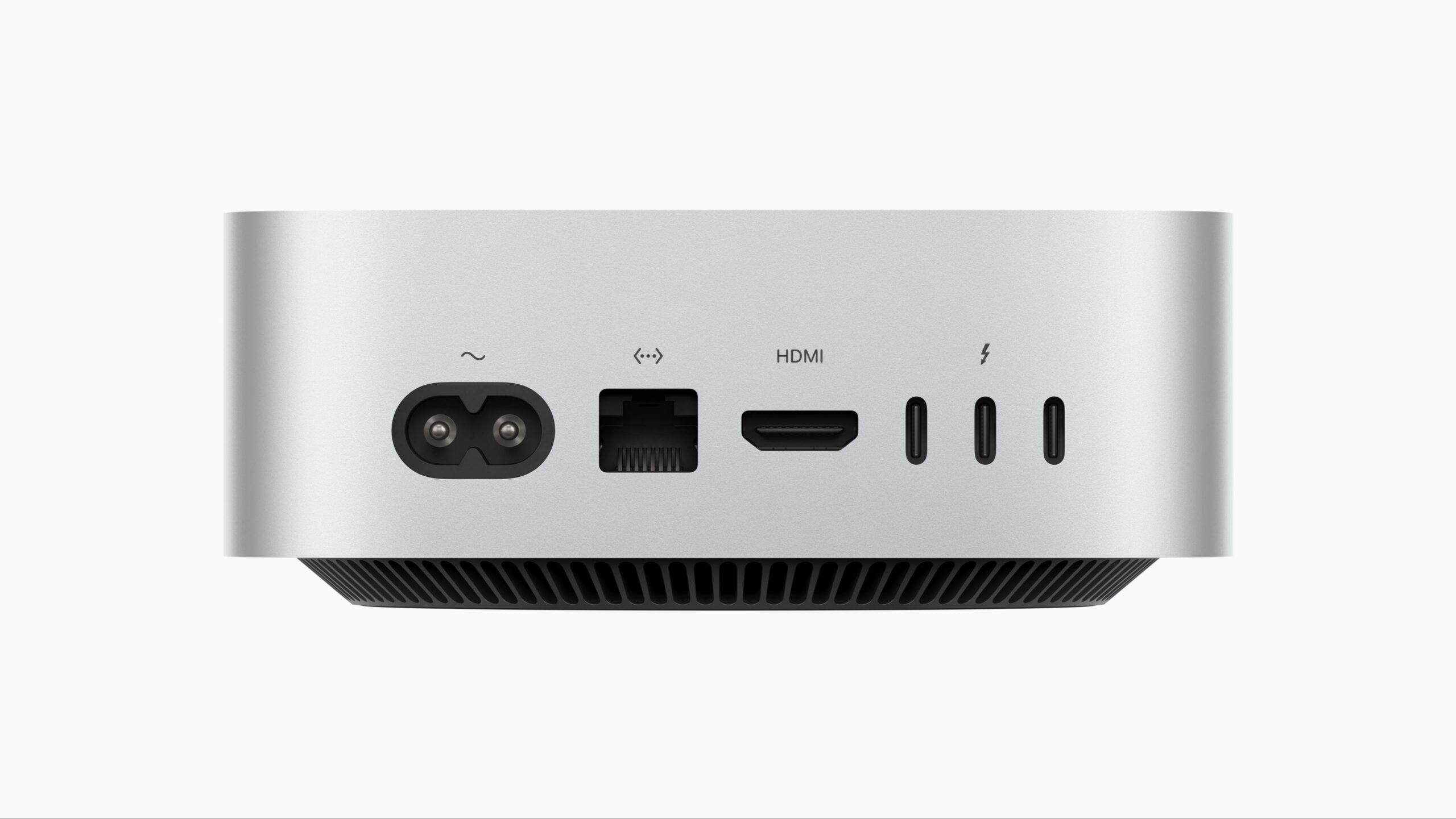 Mac miniの背面。左から電源端子、Ethernet、HDMI、Thunderboltポート3つが並ぶ
