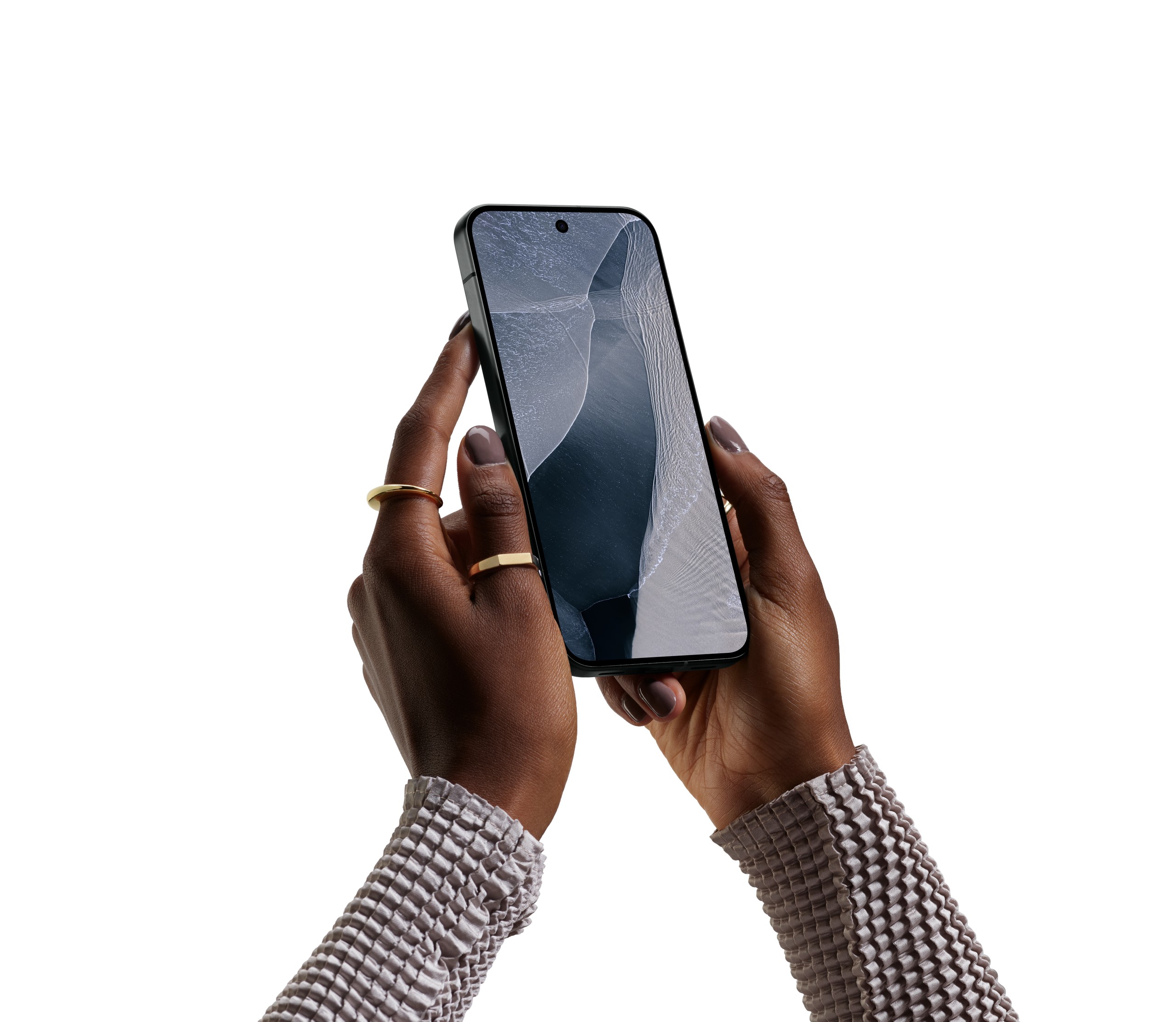 Google Pixel 11 Pro を両手で持って画面を操作している公式イメージ画像