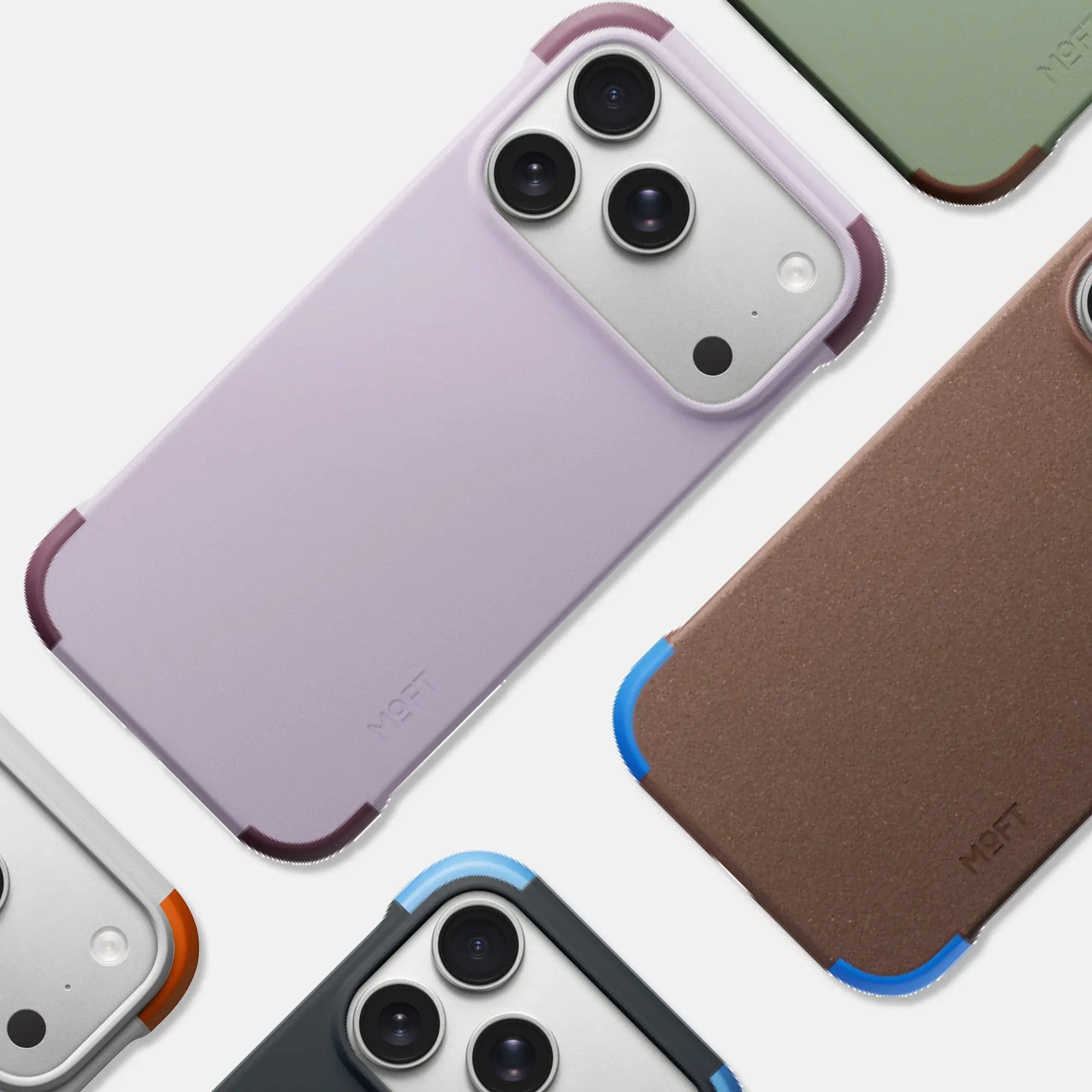MOFTのiPhone 18シリーズ用MagSafe対応バイカラーケースを並べたところ。本体の色に対して4つのコーナーだけ違う色が入っている
