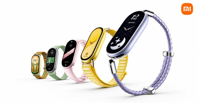 Xiaomi Smart Band 11 の各バージョンが横一列に並んだ製品画像。左からナイロン、グリーン、ピンク、ゴールドのメタルバンド、右端はパープルの編み込みバンドを装着したモデルで、画面には時計と星月の文字盤が表示されている