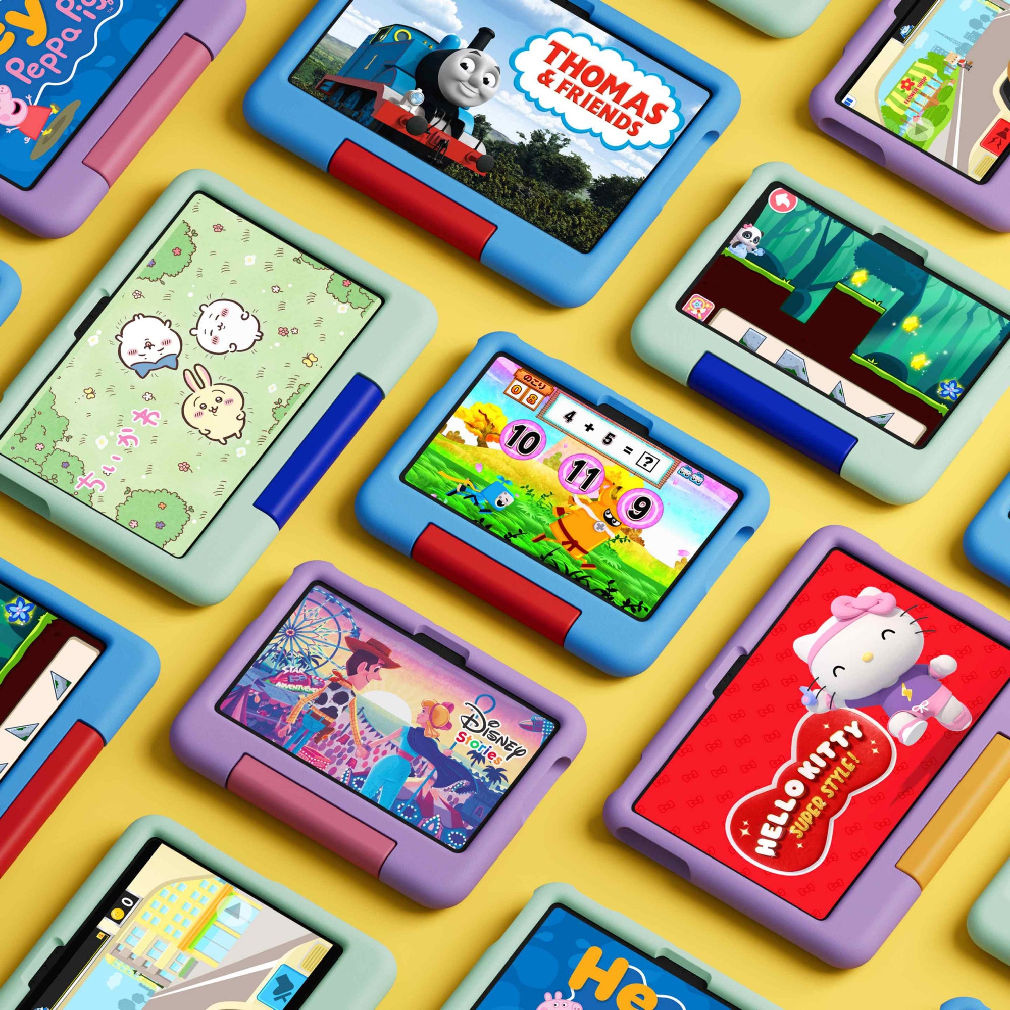 Amazon Kids+のアプリや動画が表示された、さまざまなカバーのAmazon キッズ タブレットが並ぶイメージ