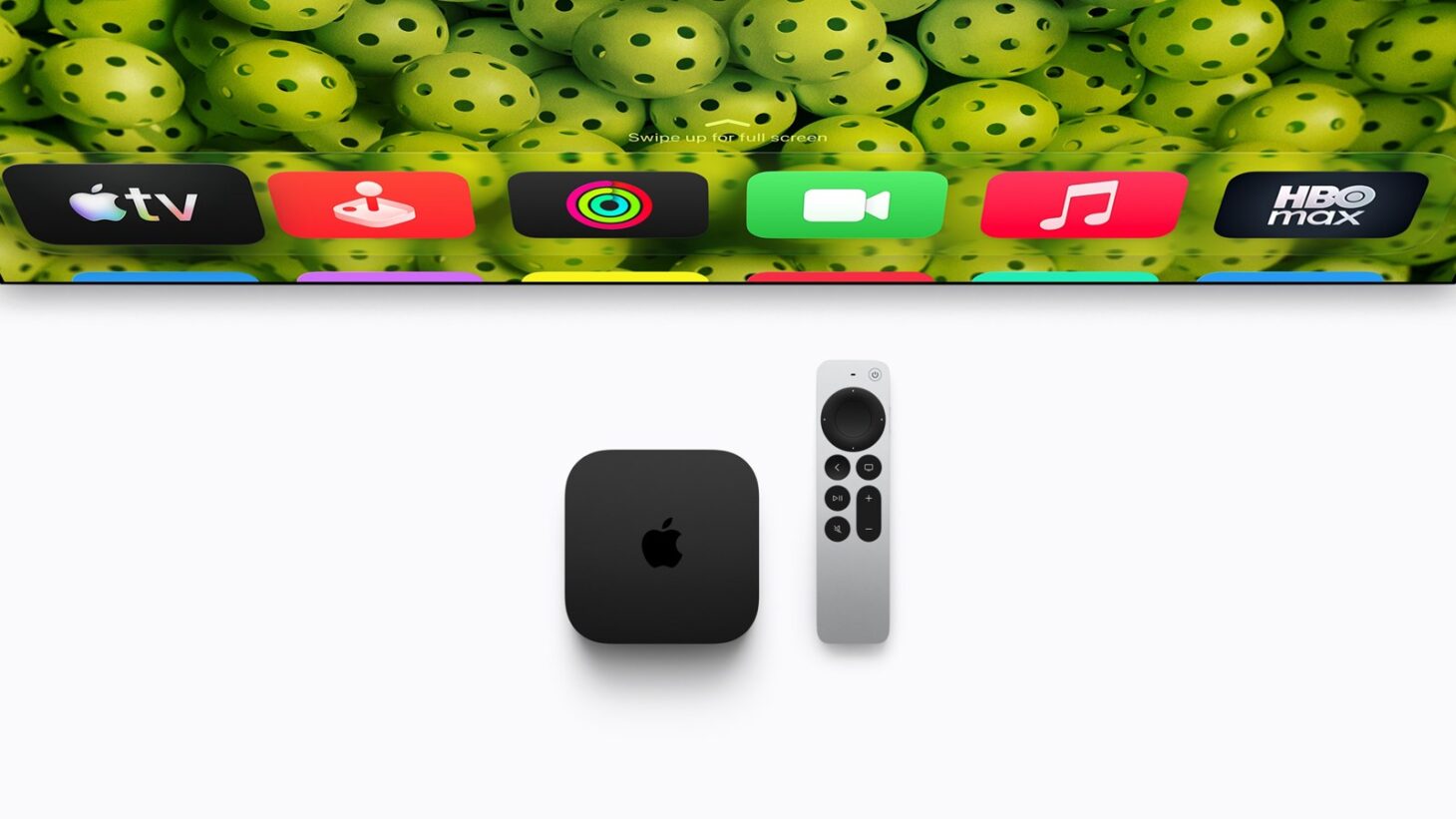 新しいApple TV 4K(第4世代)の黒い本体とSiri Remote。上にApple TVのアプリのアイコンが並んでいる